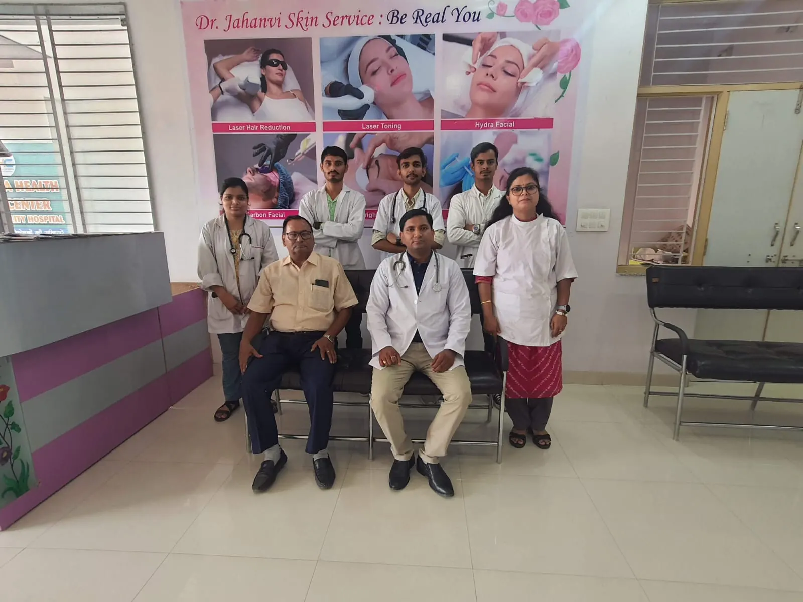 The clinic team standing together in the reception area